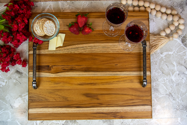 Teak Charcuterie Board With Pipeline Handles and Feet